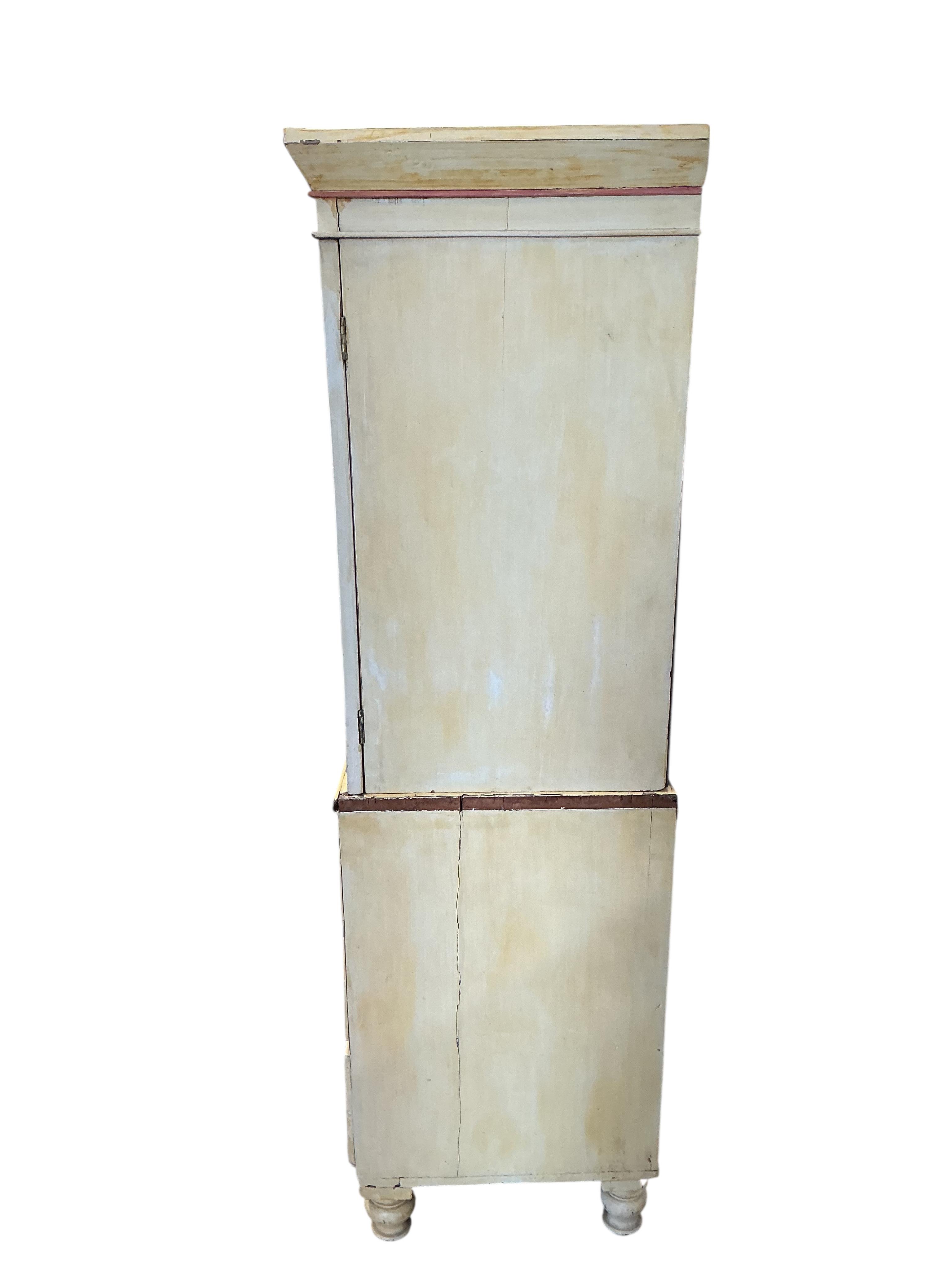 A small Victorian style painted press cupboard, width 107cm, depth 50cm, height 171cm
